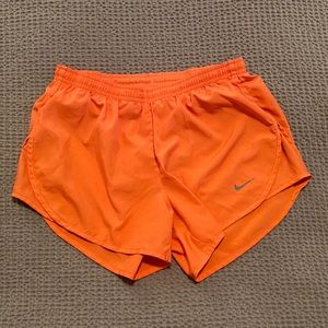 Orange nike shorts